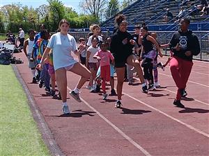 high school kids volunteered and leading the way with the warm up