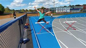 Taylor Maselli showing how to hurdle