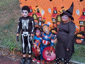 Skeleton, superheros, and witch